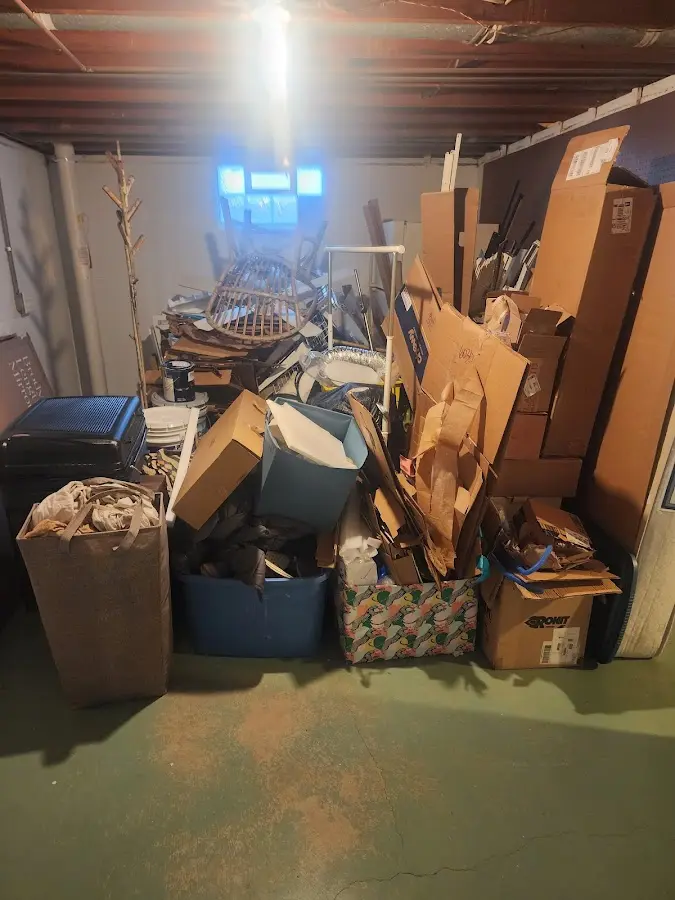 Roll-off dumpster container at job site for 2 Yard Dumpster Rental in Conway